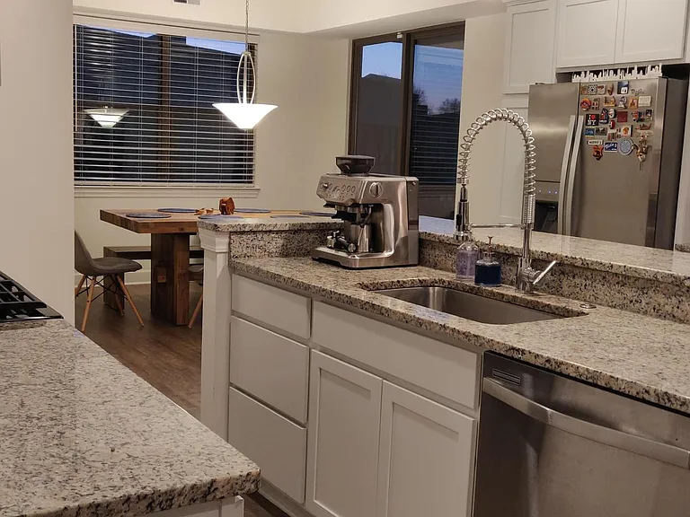 Large sink with commercial style faucet