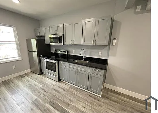1557 White Plains Rd