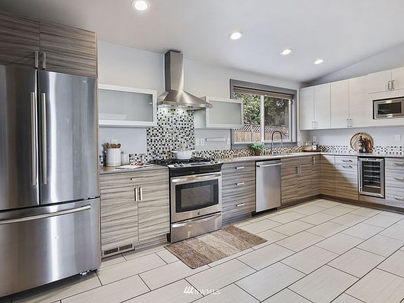 Spacious contemporary kitchen with plenty of room for an island or cart or even a small kitchen eating space