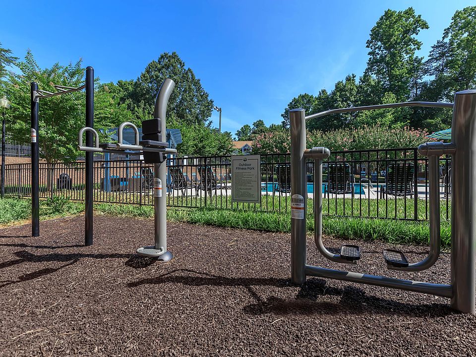 Outdoor Fitness Area Featuring Strength and Cardio Equipment