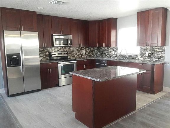4th image of 6580 Magee Ct