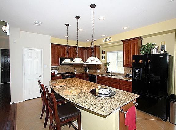 Island kitchen with walk in pantry