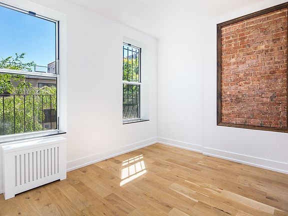 2nd image of 66 E 7th St APT 13