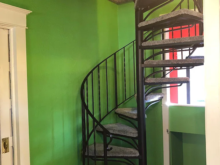 Winding staircase to upstairs