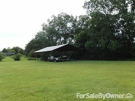 Looking at shed from back porch
						:
						Unfinished 30x 50 shed