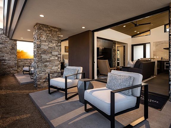 Dual covered patios at rear of home