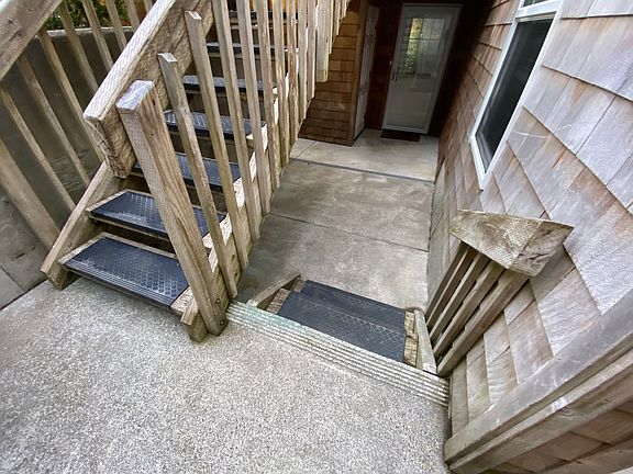 Two sets of two Stairs on way to ground level unit