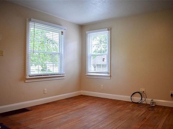 Another view of the living room. Window treatments are new.