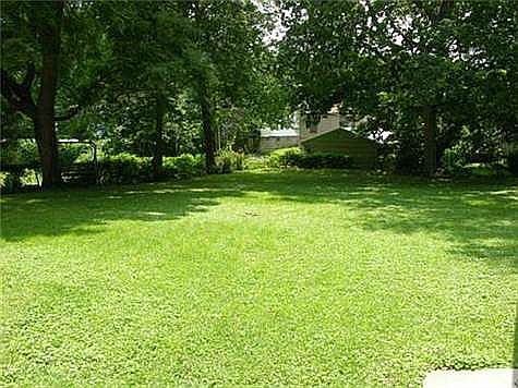 Really lush back yard, good trees, Sit on the patio and enjoy.