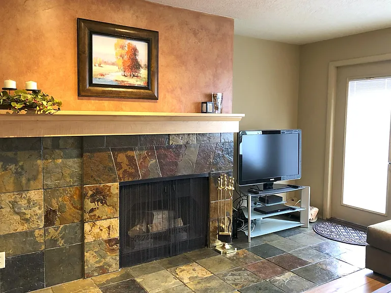 Fireplace, TV and Porch Door