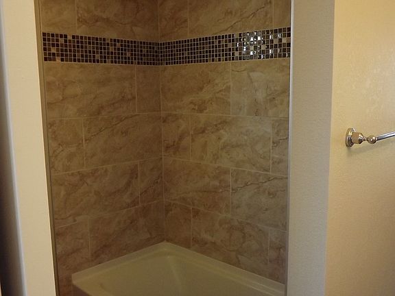 new tub and tile surround