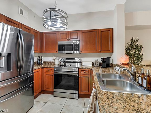 4th image of 10110 Villagio Palms Way Unit 206