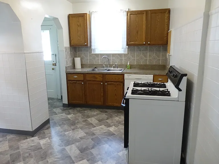 Kitchen with fresh vinyl floor.