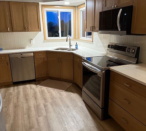 Kitchen: new cabinets and granite counter top. New microwave and stove.