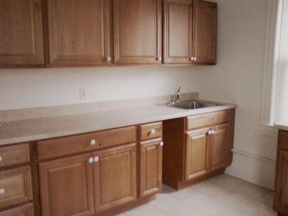 Kitchen has lots of cabinetry
