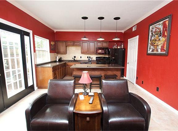 Towards back you have a Beautiful open Kitchen/Den area for the whole family to gather