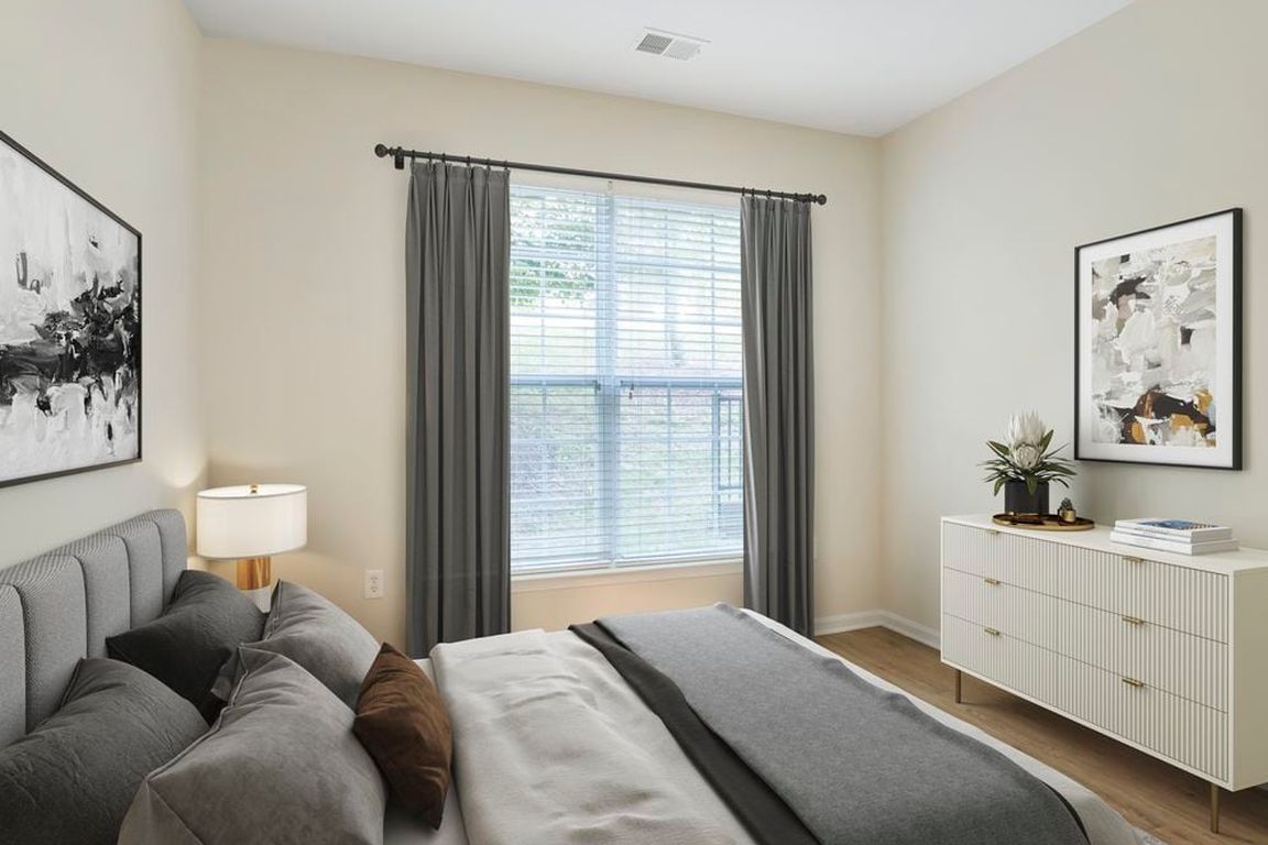 Renovated Package II bedroom with hard surface flooring