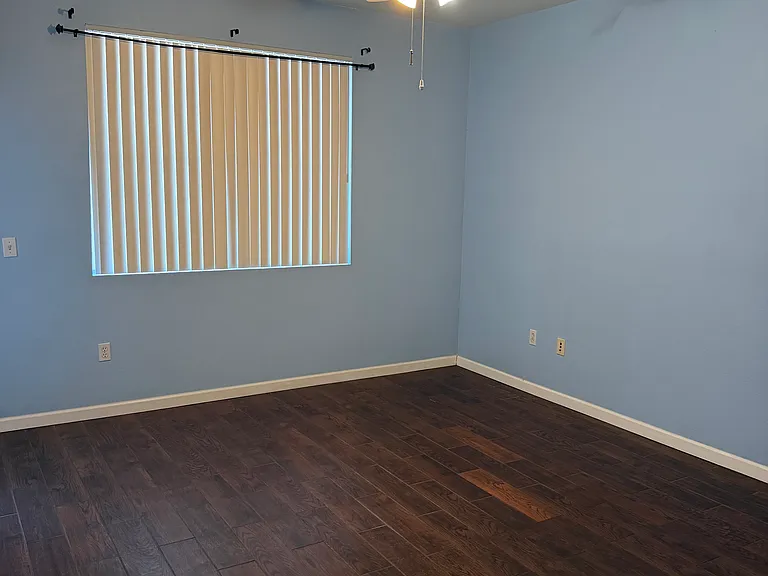 Primary Bedroom with door to patio