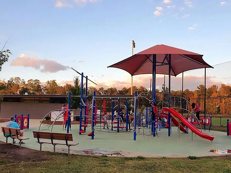 Family-Friendly Playground with Climbing Structures and Covered Play Zone