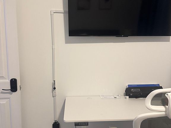 Bedroom 6 Flat screen TV and computer desk view