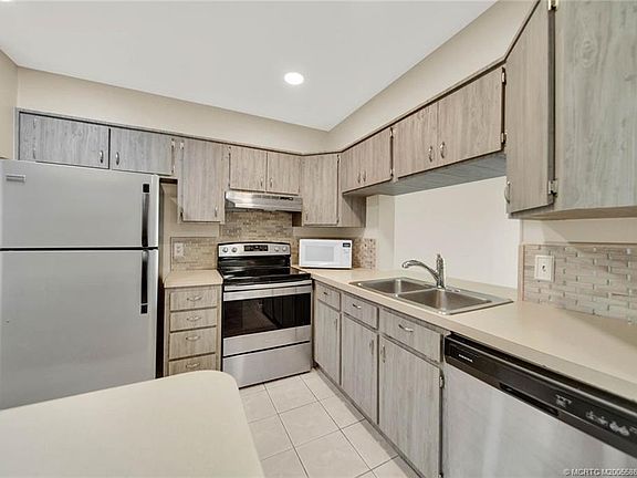 4th image of 1950 SW Palm City Rd APT 3105