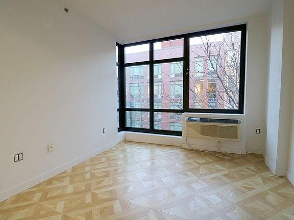 3rd image of 316 E 3rd St APT 2C