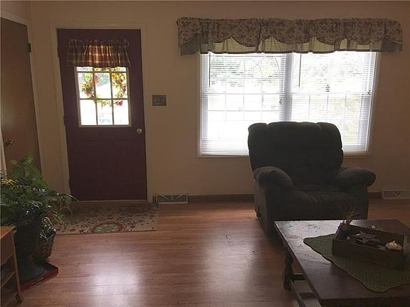 Friends will feel welcome in this pretty Living Room with big window to let in light.
