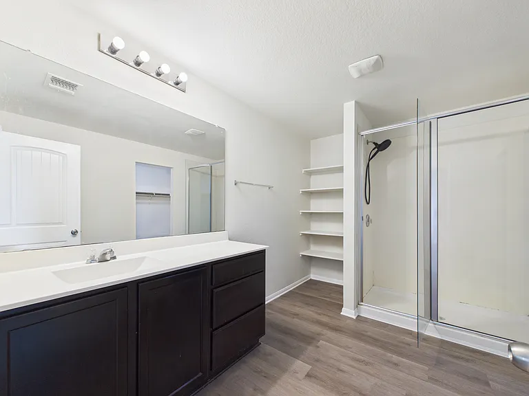 Built in storage and walk in shower