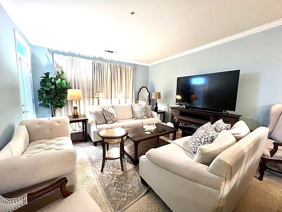 Living room leads to balcony