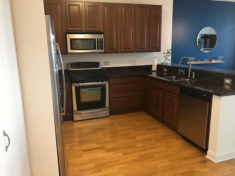 Open Kitchen with new Stainless Steel Appliances and Granite Countertops