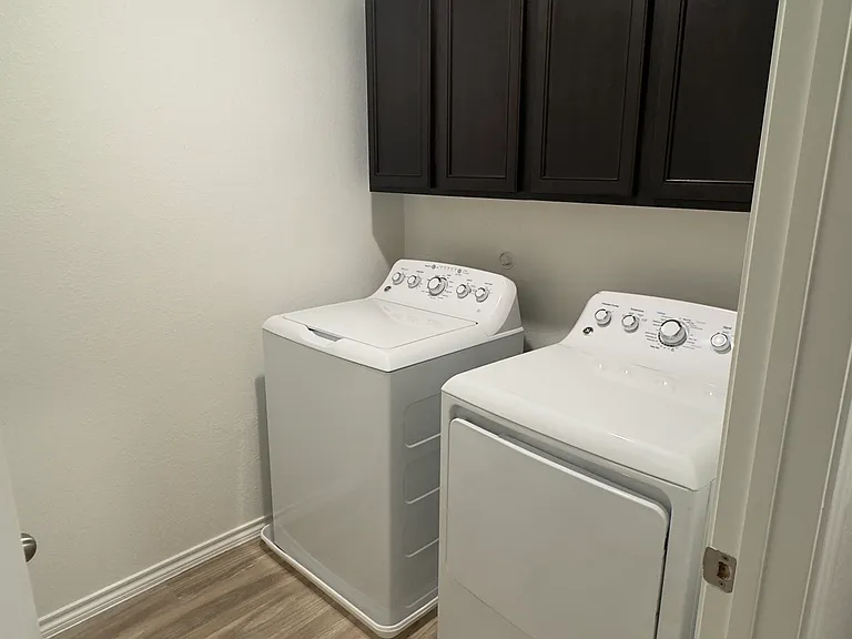 Laundry room with washer and dryer