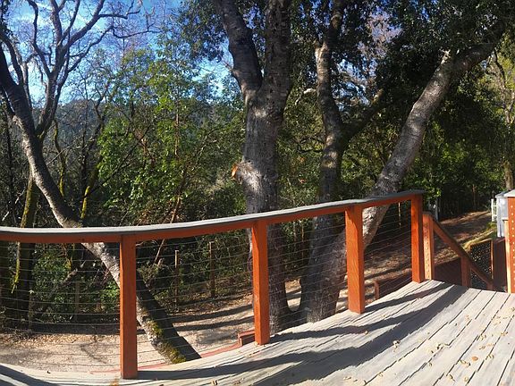 Large sunny upstairs deck with open & private views perfect for entertaining or relaxing. View of Castle Rock State Park & garden area. No street lighting for perfect stargazing evenings. No neighbor directly in front or to the right side of property & de