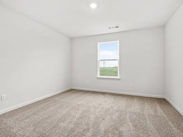 The secondary bedrooms of the Cypress floor plan are a great space for childrens bedrooms or as guest rooms.