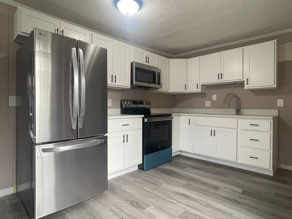 Brand new kitchen cabinets with quartz countertops and brand new appliances