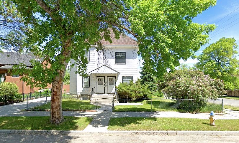 Streetside view from Fifth Avenue. Door to this apartment is to the right. Yard is shared with upstairs tenants.