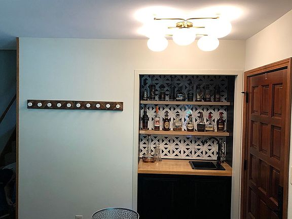 West Elm lighting in entry.