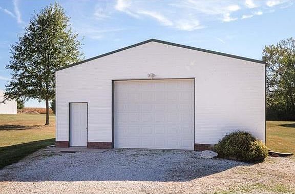 Detached, insulated garage is a dream - 30x50 w/200 amp sub panel, wood stove, water, floor drains & 1/2 bath.