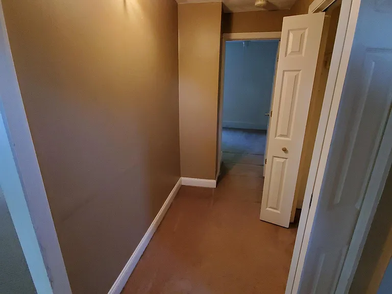 Hallway with closet