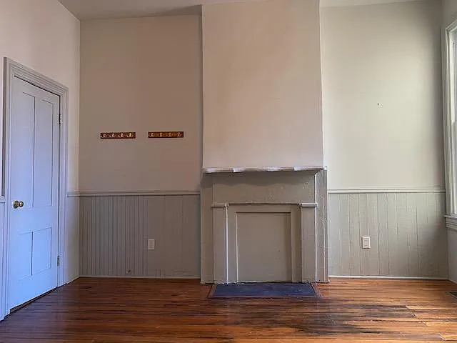 Living room (1/2 bath behind door)