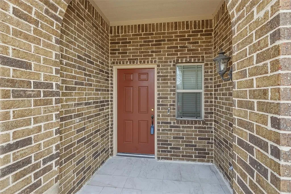 Entrance to property featuring brick siding - 1310 Hearthstone Dr