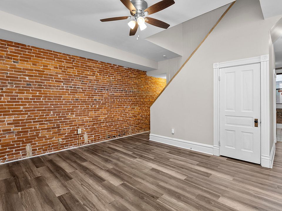 Main living area with laundry closet.