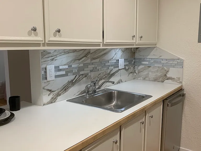 Kitchen opens to eating area and main grand room