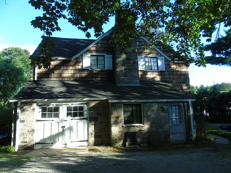 Back of house, garage and outdoor parking