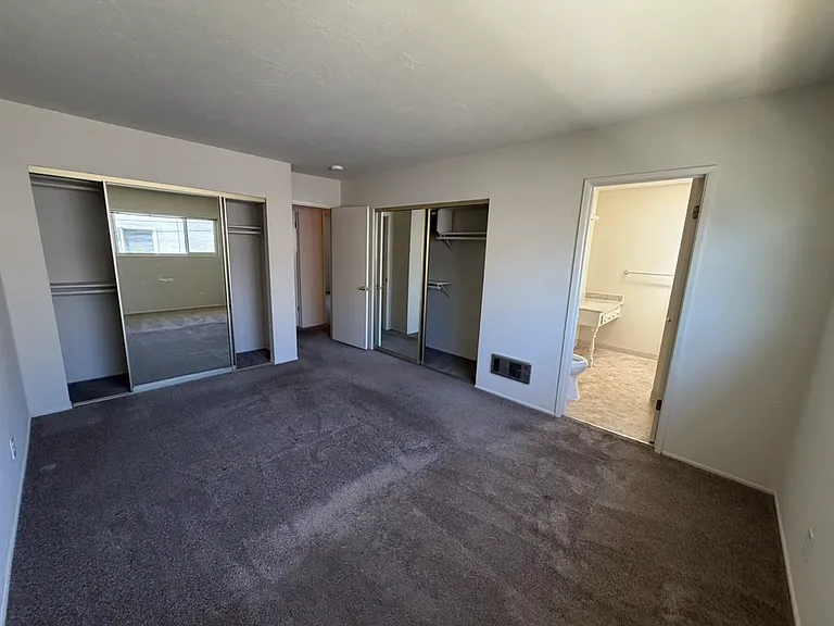 master bedroom with access to full bath