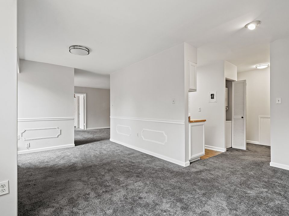 Breakfast/Dining area looking to kitchen and formal dining/sitting area.