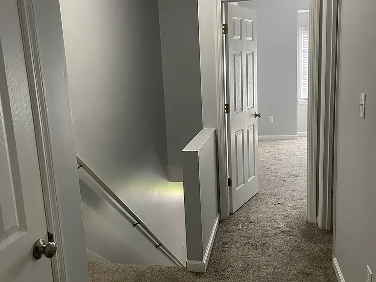 Two large bedrooms and baths are located upstairs.