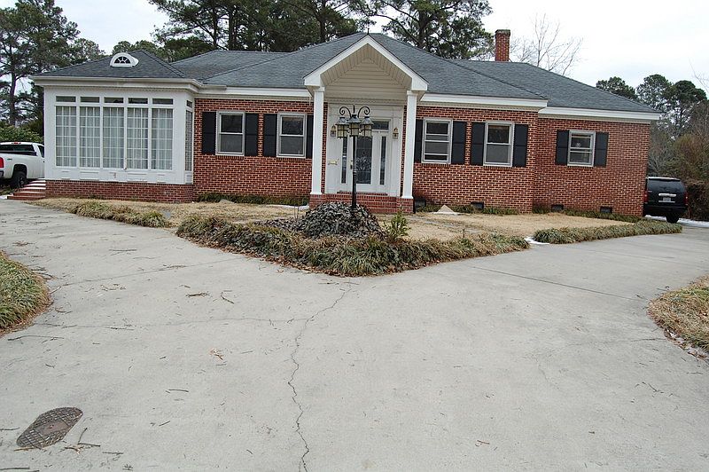 Front view of home
						:
						Brick ranch, multiple driveways/parking. All replacement double pane windows.