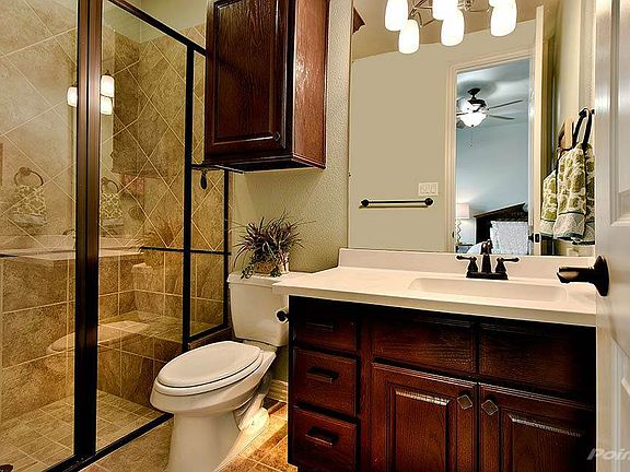 Secondary Bedroom downstairs has its own attached bathroom.