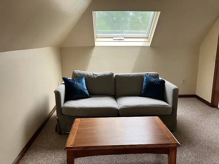 Living area with sofa & raisable coffee table