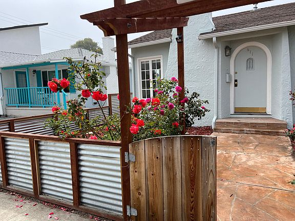 Front entry way and rose garden